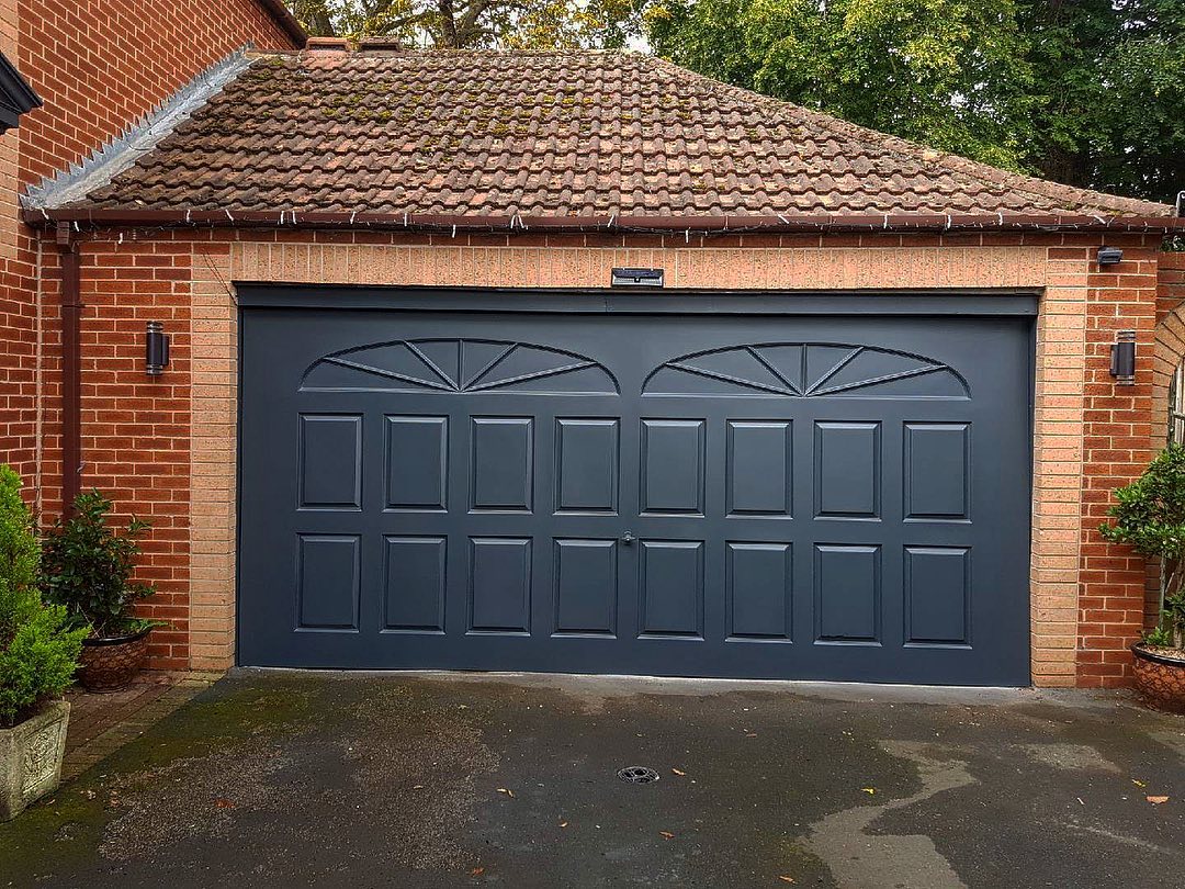 Thinking about replacing a garage door? Then THINK again....