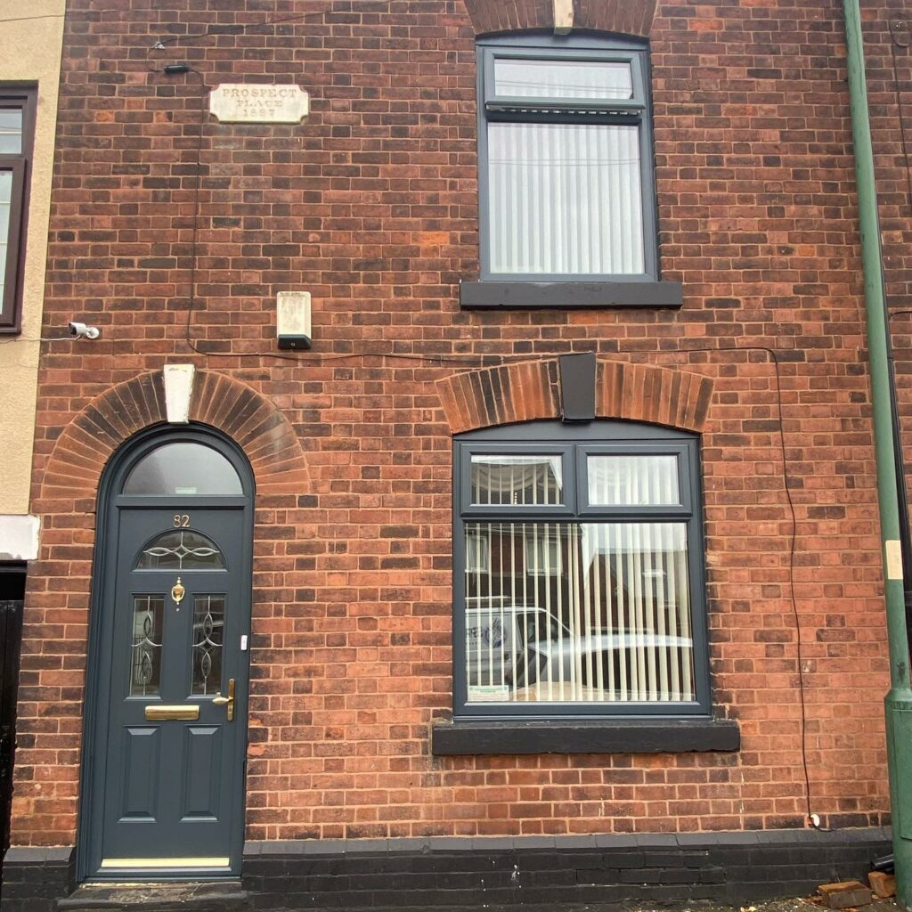 Windows and Doors sprayed on the front and rear of this property....